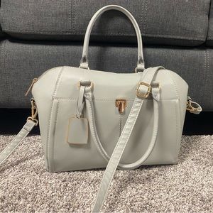 Large grey with gold hardware crossbody purse